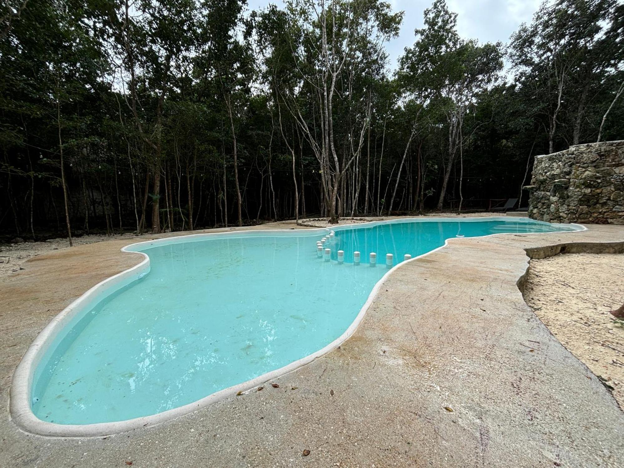 Aldea Maya-Ha Cabanas Con Cenotes ปัวร์โตโมเรลอส ภายนอก รูปภาพ